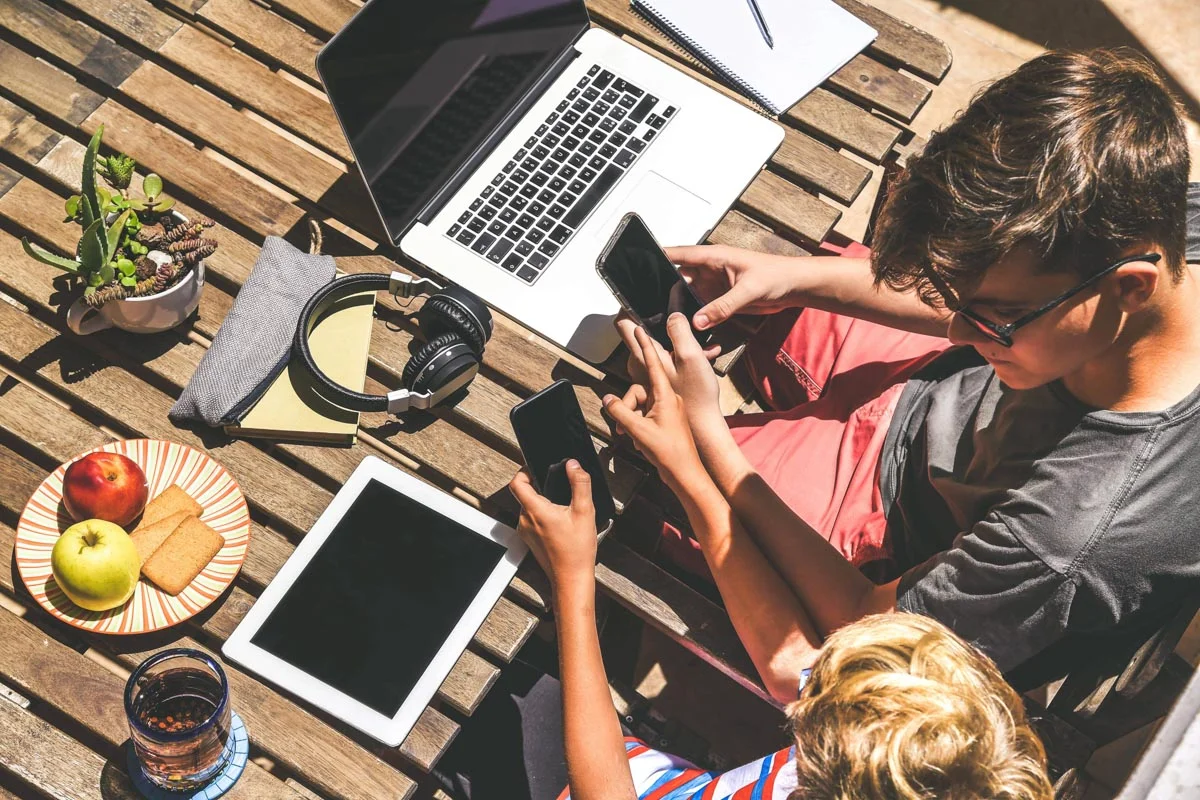 Brisbane customer discovery through local SEO showing people using devices to research local businesses