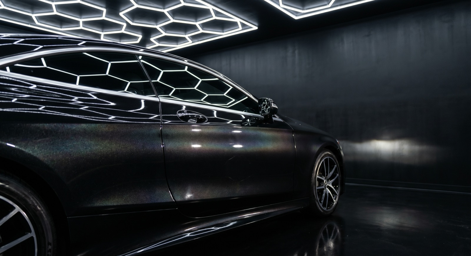 Black coupe paint correction & ceramic coating — before