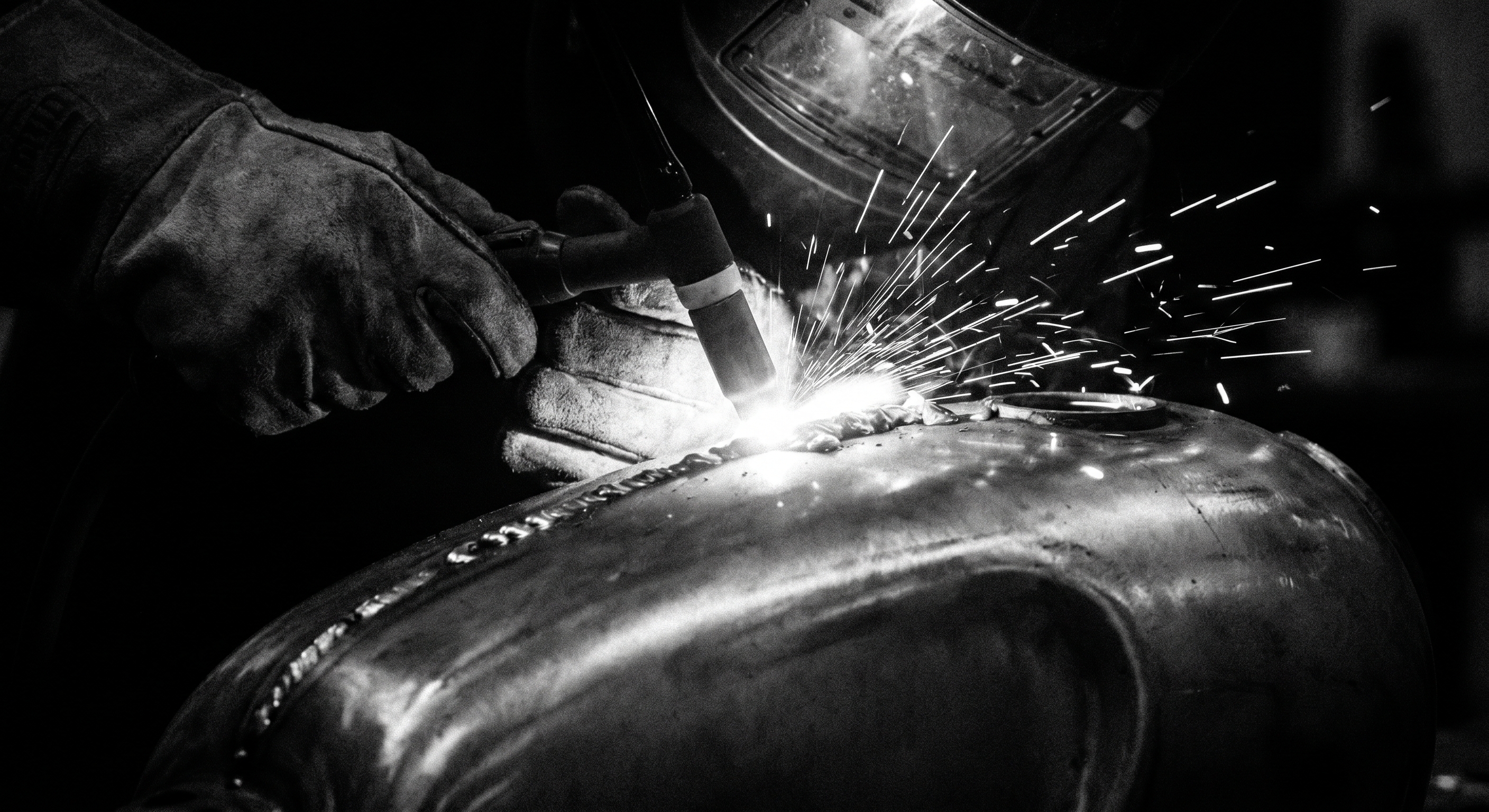 TIG welding a custom motorcycle tank